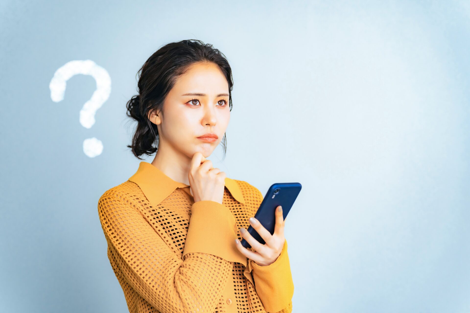 疑問を持つ女性